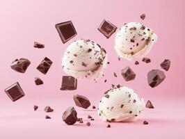 Delicious chocolate ice cream scoops with floating chocolate pieces photo