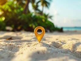Golden location pin stands out on sandy beach during sunset photo