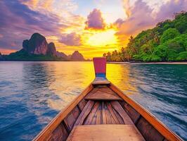 Sunset view from a wooden boat on calm waters in Thailand photo