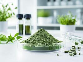 Green powder and capsules with herbal extracts in a laboratory setting photo