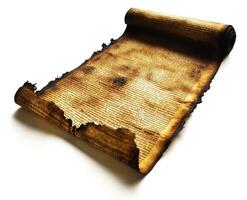 Old scroll with burnt edges displaying historical text and faded markings on a white background photo