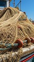 A boat with a net on it photo