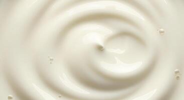 A swirl of white cream on a white background photo