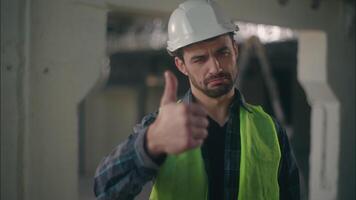 Satisfied Caucasian guy demonstrating thumb up in construction workman supervisor approve builder man positive successful sign male architect agreement electrician supporting feedback inspector work video