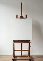 An easel with a blank canvas on it photo