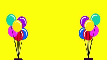A colorful bunch of balloons suggests a festive, cheerful event setting against a bold yellow backdrop, emphasizing energy and joy video