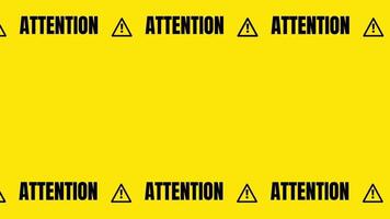 A linear yellow sign repeating the word 'ATTENTION' and warning icons, designed like marking tape to highlight danger zones repeatedly video