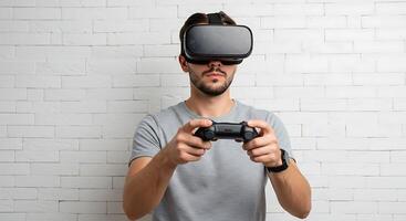 A man wearing a vr headset holding a game controller photo