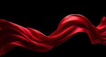 Red silk fabric on black background photo