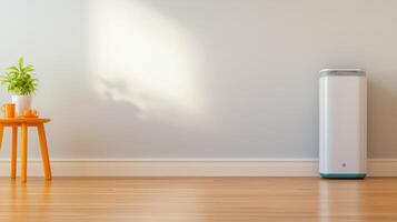 A white air purifier sits on a wooden floor next to a plant photo