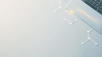 Laptop and white background with molecule symbols photo