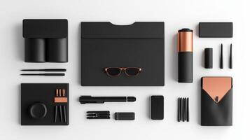 A black and copper office stationery set on a white surface photo