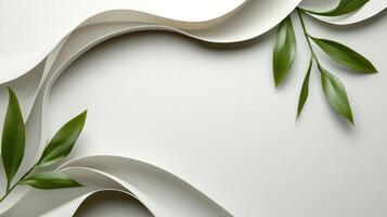 White paper with green leaves and curving lines photo