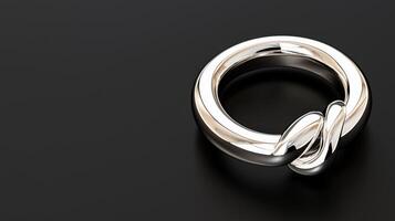 A silver ring with a knot on it photo