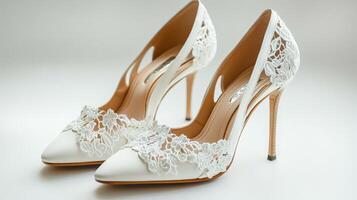 White wedding shoes with lace detailing photo