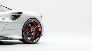 A white sports car with red rims on it photo