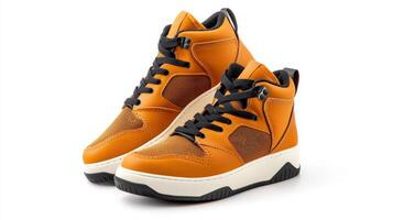 A pair of orange high top sneakers on a white background photo