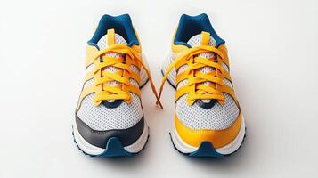 A pair of yellow and blue sneakers on a white background photo