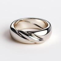 A wedding ring with two twisted bands photo