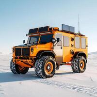 A large orange vehicle with a solar panel on top photo