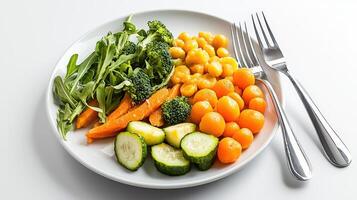 A plate with vegetables and a fork photo