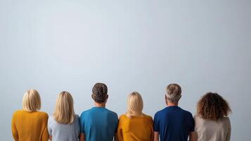 Back view of people standing in a row photo