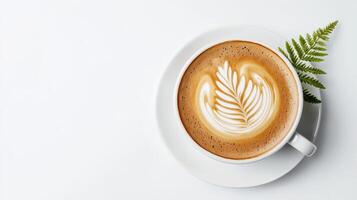 Coffee with latte art on white background photo