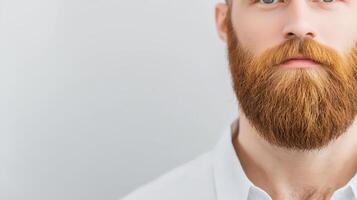 A man with a beard and a white shirt photo