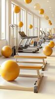 A gym room with yellow balls hanging from the ceiling photo