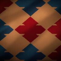A red, blue and white patterned rug photo