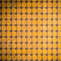 A yellow and black background with many flowers photo