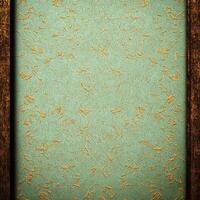 An old wooden frame with a gold pattern photo