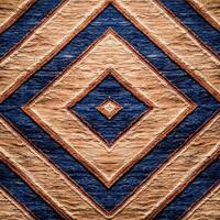 A blue and brown rug with a diamond pattern photo