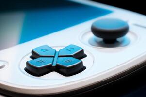 Game controller, buttons and parts, close-up. Side view, nobody there, retro modern hobby equipment photo