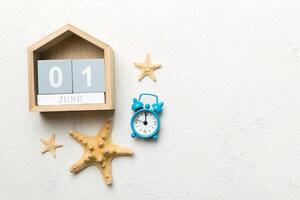 June 1th. Image of june 1 wooden calendar on colored background. Empty space for text photo