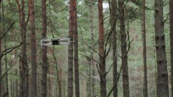 Drone Flying Through Forested Area. advanced technology video