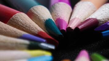 Vibrant Array of Colored Pencils Against a Dark Background video