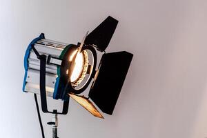 Professional lighting equipment positioned for a studio setup during a creative project photo