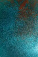 Colorful abstract texture with teal and rust highlights creating a vibrant visual experience photo