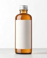 A brown bottle with a white label on it photo