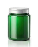 Green glass jar with silver lid isolated on white background photo