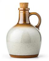 A white and brown jug with a cork stopper photo