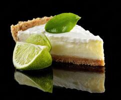 Classic lime pie with fresh lime slices and mint leaves for dessert photo