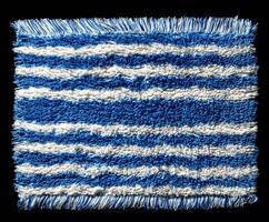 Blue and white striped textile with fringe for home decor and design photo