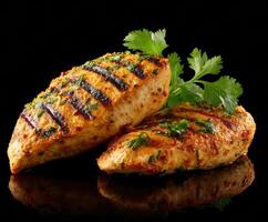 Grilled chicken with herbs and spices on a black background photo