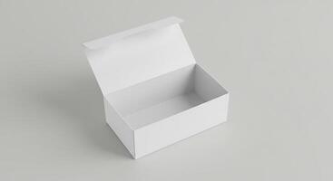 White box with lid open on a plain surface photo