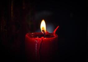 Light a candle in the dark photo