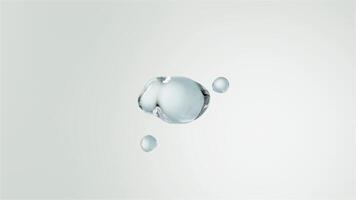 Water droplets merging into a sphere video
