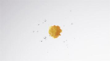 The process of yellow objects gradually dissolving, disappearing, and wrapping in water video