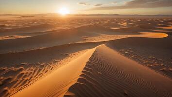 Sand Dune at Sunset in a Vast Desert Landscape photo